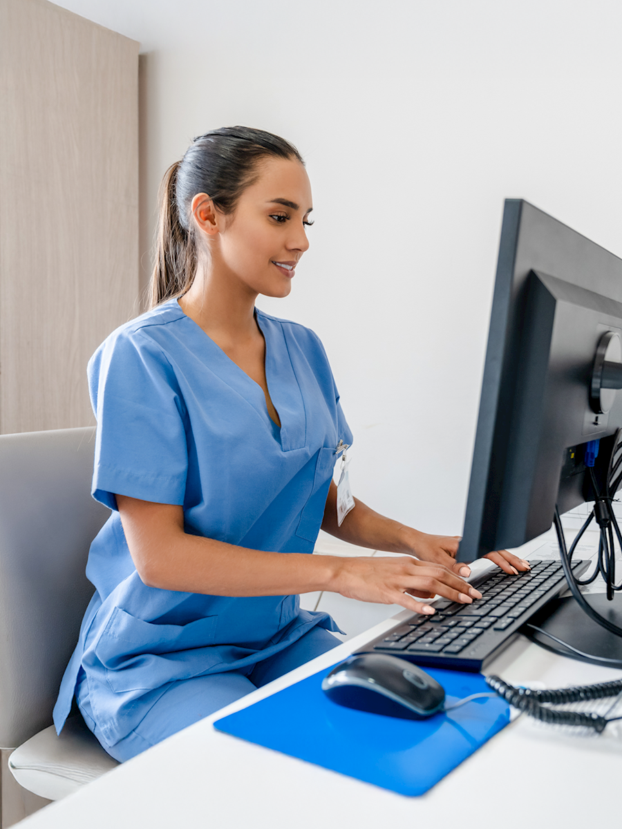 healthcare worker on a tablet