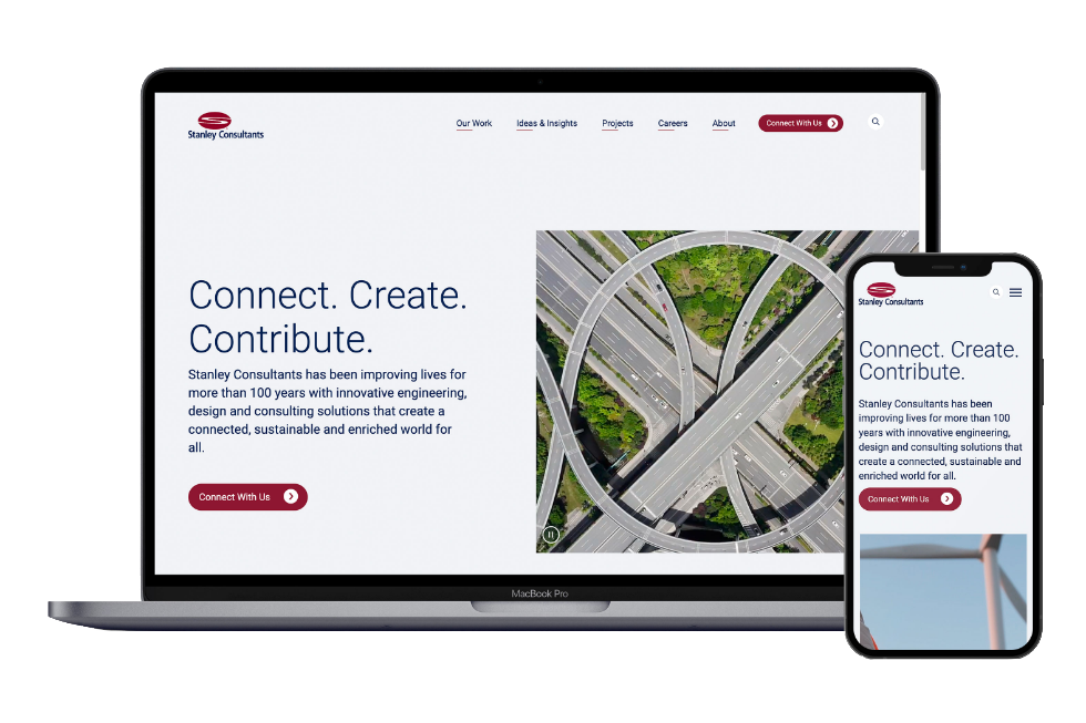 Stanley Consultants website displayed on a laptop and mobile phone