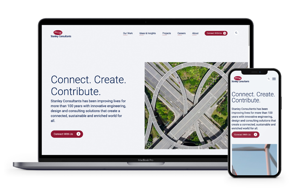 Stanley Consultants website displayed on a laptop and mobile phone